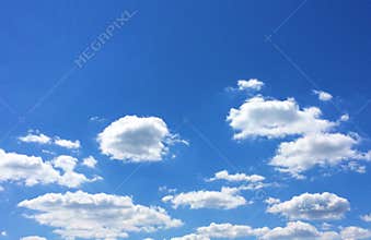 Blue sky and white puffy clouds