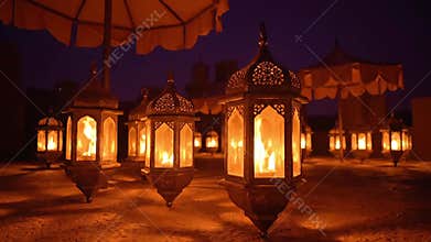Intricate Golden Lanterns at Night for Ramadan and Eid Mubarak Celebration