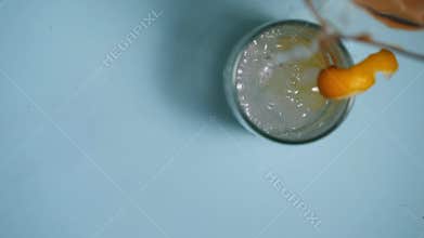 Serving of fizzy lemonade juice in a glass