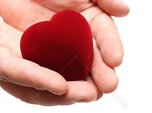 Man's hands gifting heart on valentine day