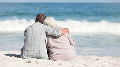 Hand choosing a clip of seniors relaxing
