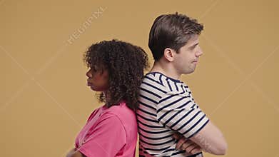 Interracial Offended Couple. Quarreling, Standing Back. Selfishness, Resentment