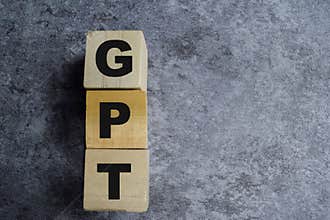 GPT - Generative Pre-Trained on stacked wooden cubes on the table. Business and finance concept