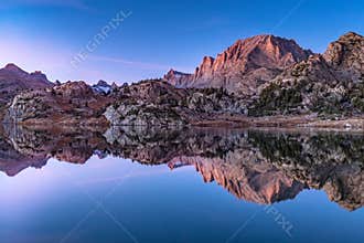 Alpine mountains Landscape with Island Lake on early morning