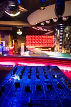 Dj mixer at a nightclub.