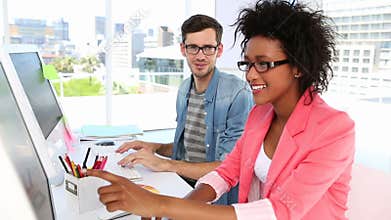 Happy creative team working together