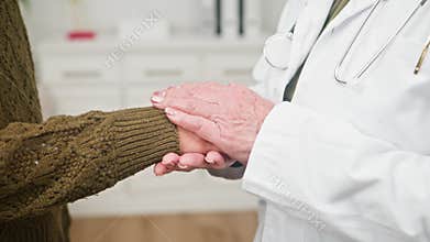 Caring Doctor Provides Reassurance And Support To A Patient During A Medical Consultation