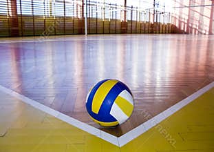 Volleyball in school gym indoor.