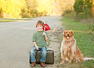 Boy Traveling with Dog