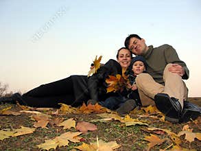 Family with autumn leaves 2