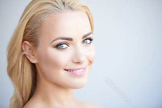 Beautiful blond woman with a lovely smile