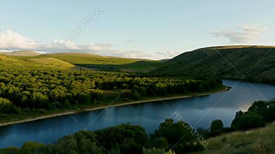 Tranquil River Winding Between Lush Green Valley Hills Under Expansive Sky