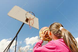 Girl playing basketball