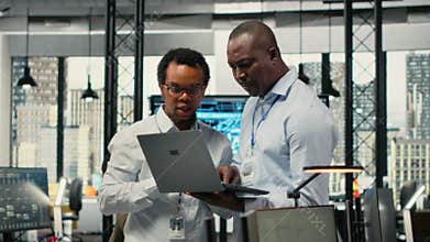 Programmers in office doing software development, brainstorming