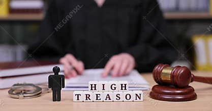 Courtroom drama unfolds as high treason case captures attention during tense proceedings