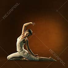 Woman in yoga position. Lakini