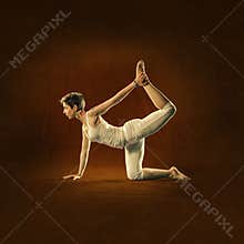 Woman in yoga position. Kokija