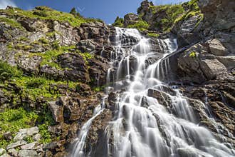Capra Waterfall located on famous road Transfagarasan in Romania