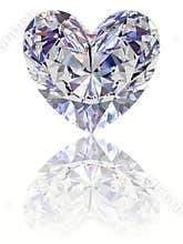 Diamond in shape of heart on glossy white backgrou