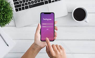 KHARKOV, UKRAINE - December 23,2018: Woman log in with Instagram
