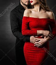 Couple Fashion Beauty, Woman in Red Dress and Embracing Man in Love