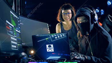 Two programmers are laughing during hacking process