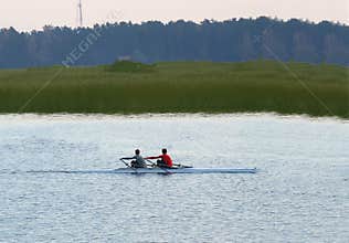 Athletes train on rowing to the two