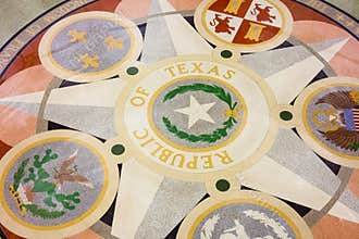 AUSTIN, TEXAS - MARCH 28, 2018 - Seals on the floor of the Texas state capitol building or statehouse rotunda in Austin