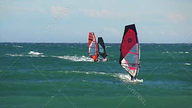 Windsurfer on the Spanish Costa Brava near the town Palamos in a windy day