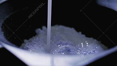 Professional coloring and hair care in slow motion. Close up view