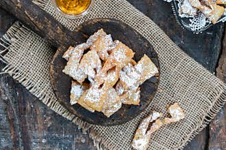 Italian carnival fritters dusted with icing sugar