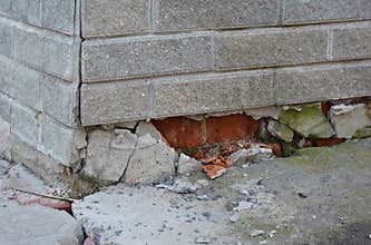 Foundation house wall damage from wetness. Foundation walls with
