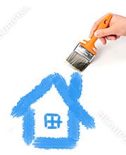 Hand with brush is drawing house.