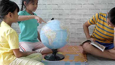 Asian Children`s Learning About Geography.