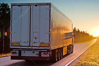 Truck on road in the evening