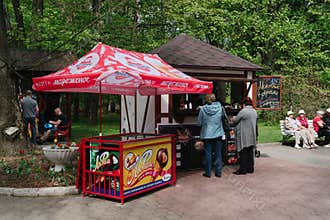 People buying food at a market