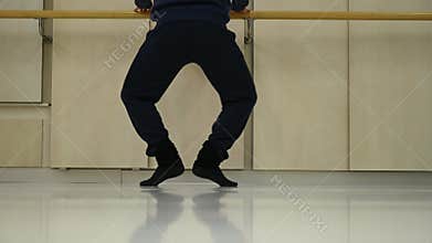 View from behind of a male ballet dancer