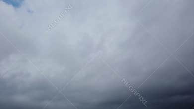 Awe timelapse of smoky sky with dense nimbostratus cloud running fast in the air