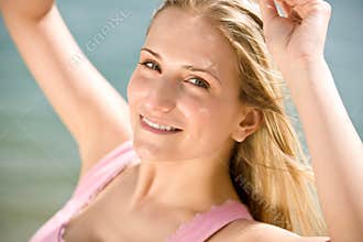 Portrait of blond woman enjoy summer sun