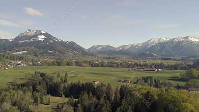 Flight over Bavarian landscape close to the alps