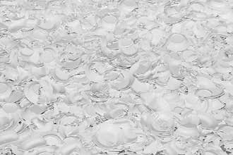 Large number of white broken plates as a background or backdrop