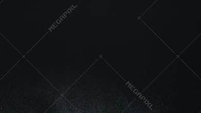 Water spray against black background shot at 1000fps. Shot on Phantom flex 4k.