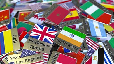 Souvenir magnet or badge with Casablanca text and national flag among different ones. Traveling to Morocco conceptual