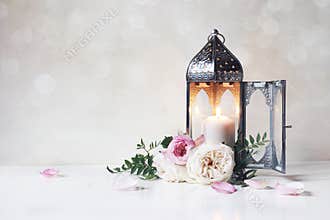 Festive greeting card, invitation for Muslim holiday Ramadan Kareem.Vintage Moroccan lantern with glowing candle, green