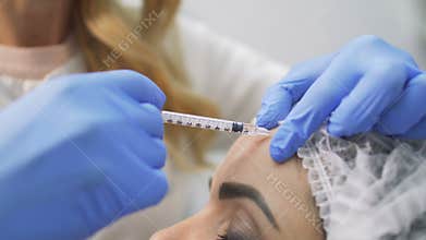 Botox injection in forehead
