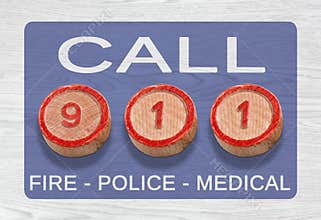 Three Wooden Pieces Depicting 911 Emergency Number