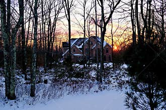 Rustic Brick Home in Country Setting at Sunset