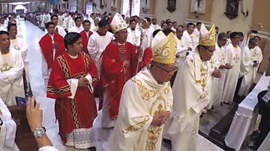 Catholic priests March In Religious Procession