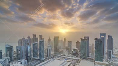 Skyscrapers at sunset timelapse in the skyline of commercial center of Doha, the capital Qatar