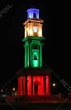 Historic victorian clock tower illuminated